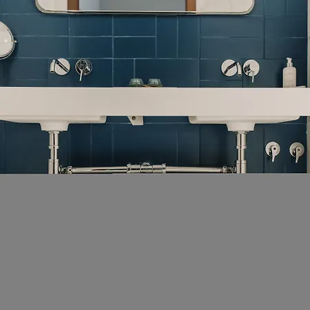 Mate Helen Berger Boutique